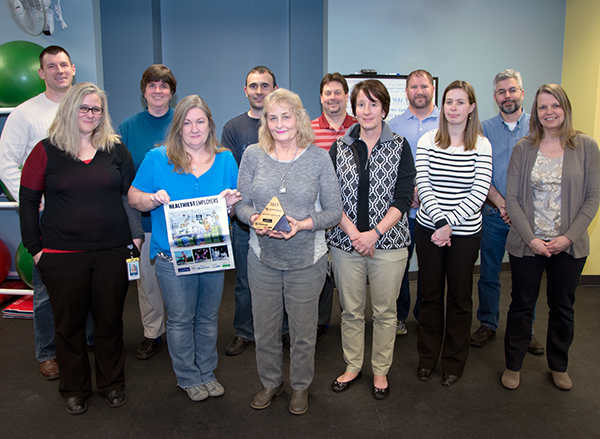 Lake Shore Wellness Committee members with the 2015 Healthiest Employer award. 