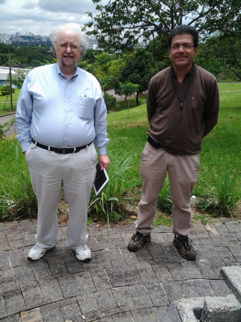 Dr. Jeff Lindemuth and Marcelo pose in front of the Sao Paulo skyline.