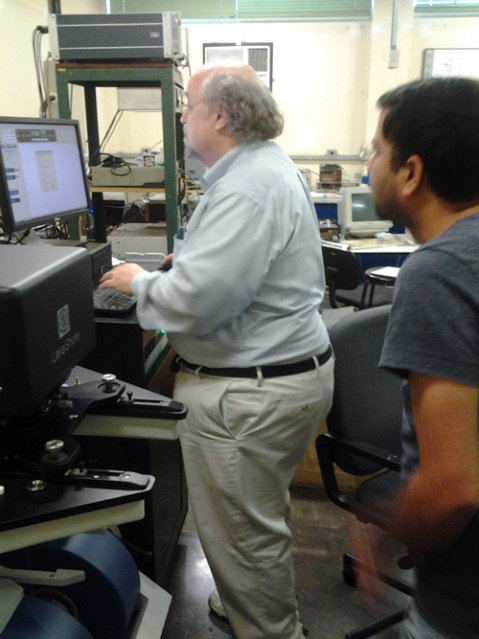 Jeff assists a member of the Institute of Physics at one of their first measurements using their new Lake Shore VSM.